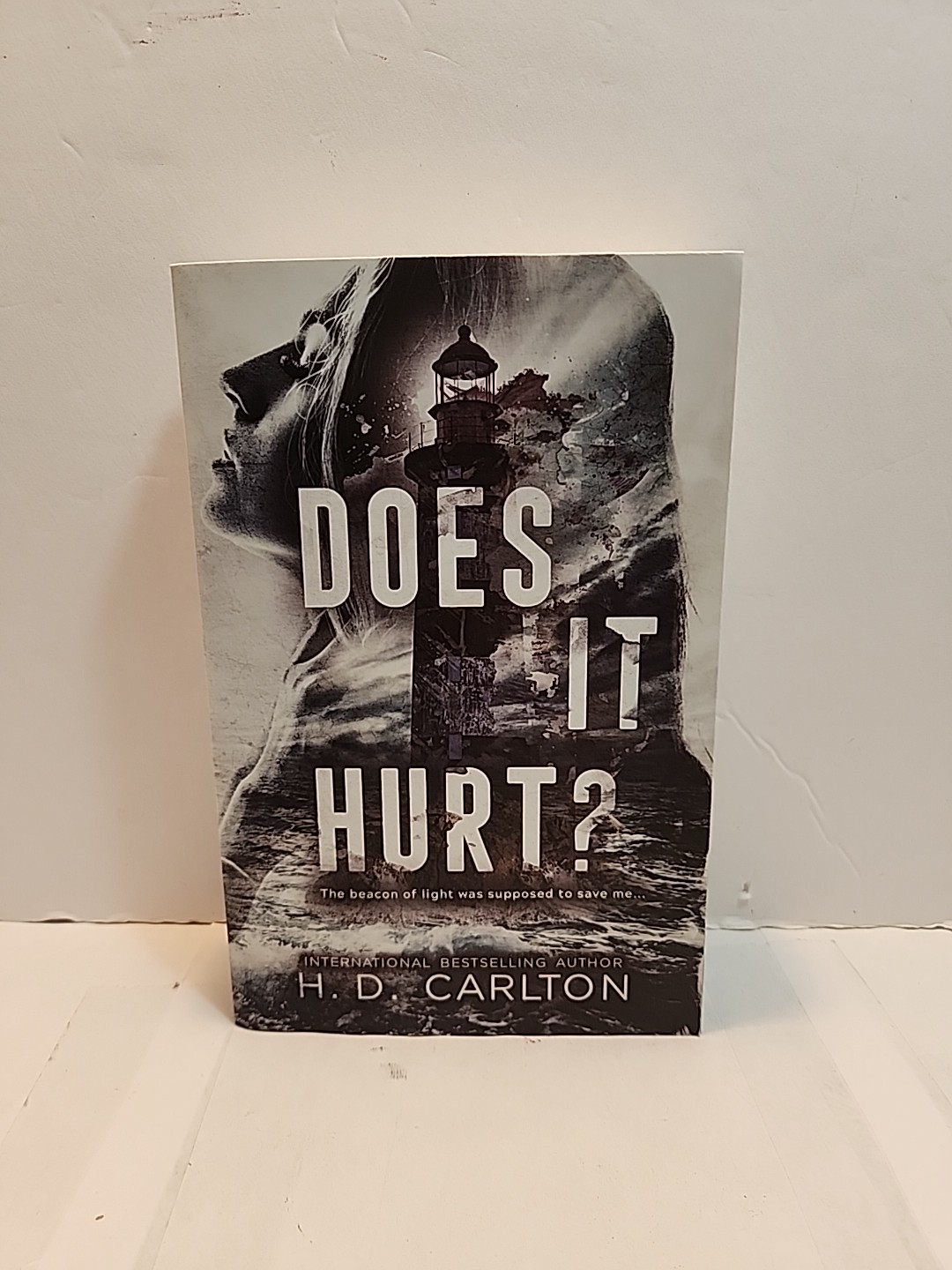 Does It Hurt? Paperback Book H. D. Carlton